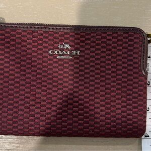 Coach corner zip Wristlet.